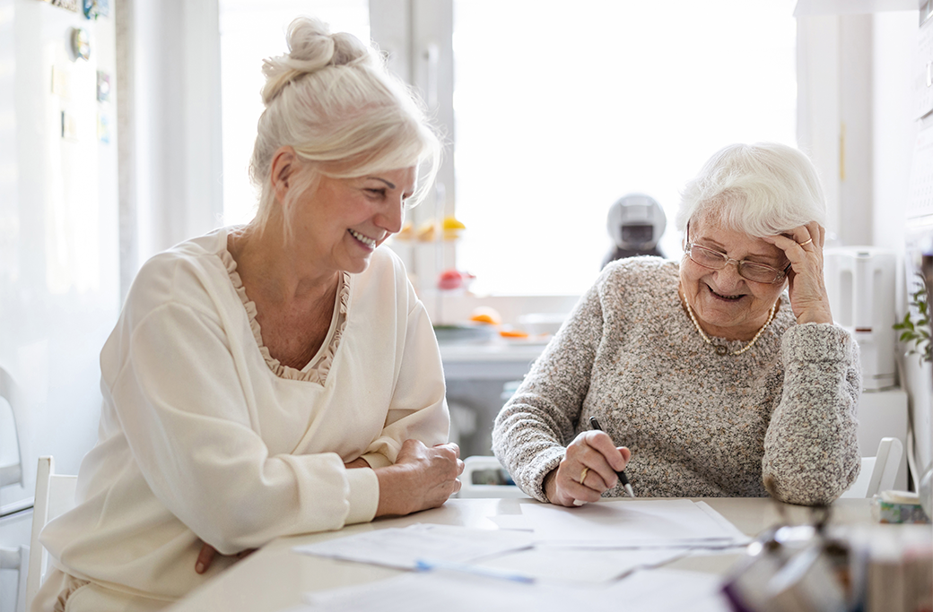 Patient organizing medical records and medication information before an eye specialist appointment