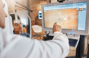 Retina specialist evaluating a patient near Brookline MA at MERSI